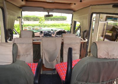 Front Seat & Dash View of 4x4 Pop up Open Sided Landcruiser